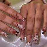 White coffee gold beads decorate the flower pattern nail tip