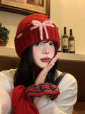Bow red knitted hat