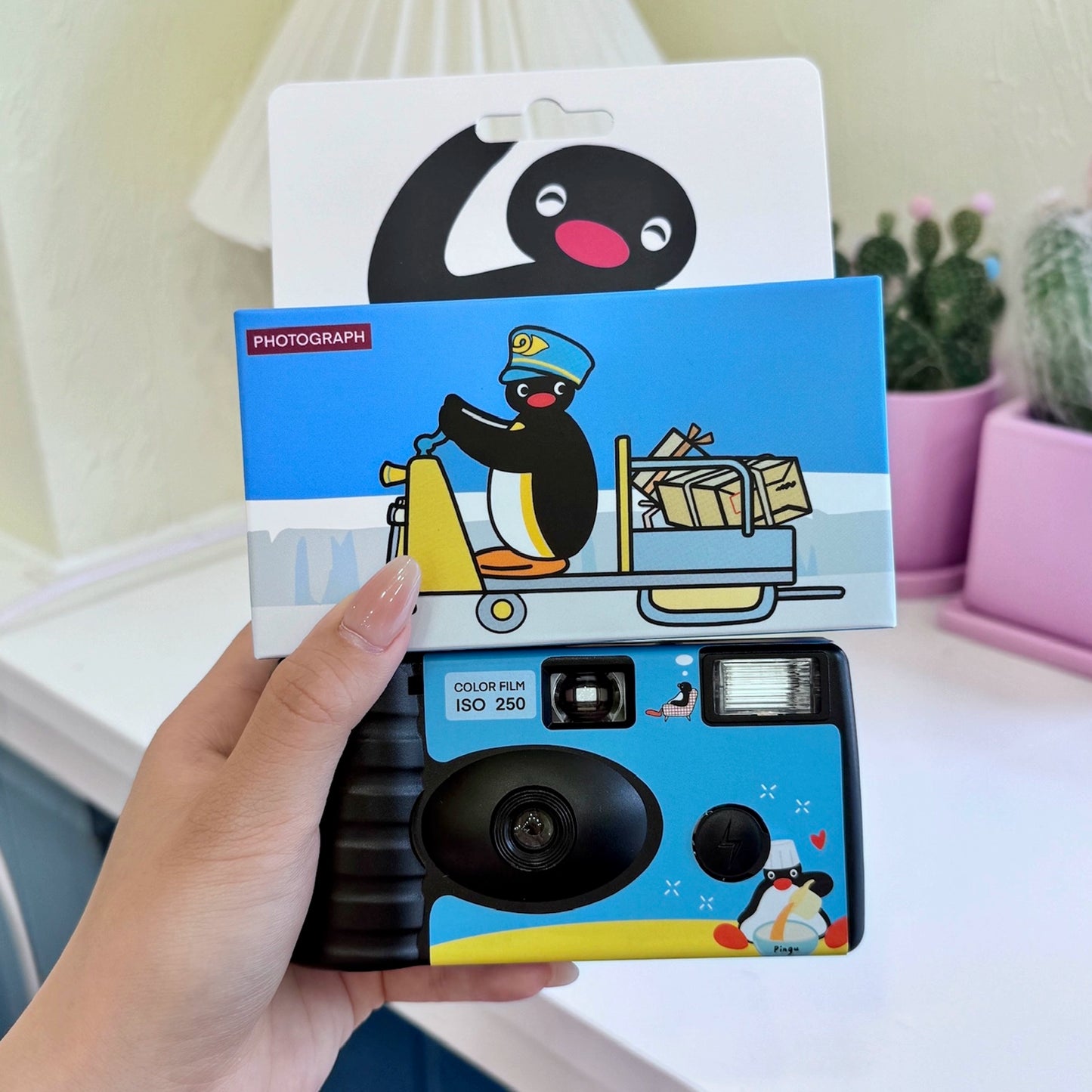 Pingu Penguin disposable film camera, point and shoot film machine