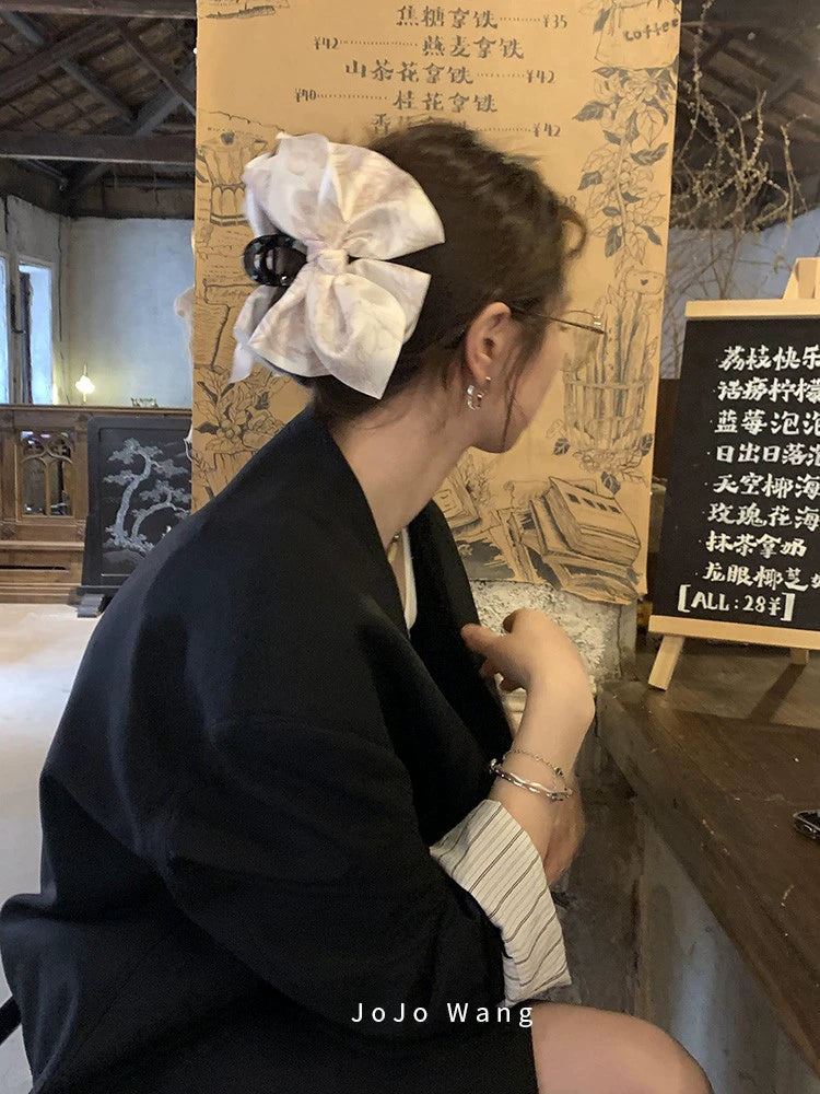 Satin bow hair catcher