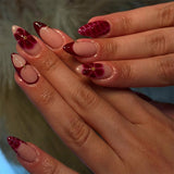 Marble cracked red almond manicure