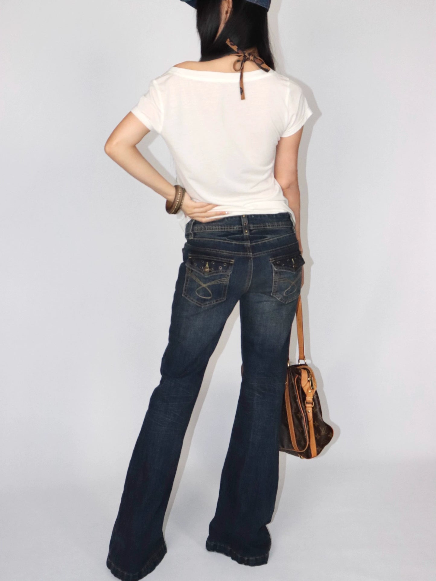 Rivet trimmed low-rise jeans