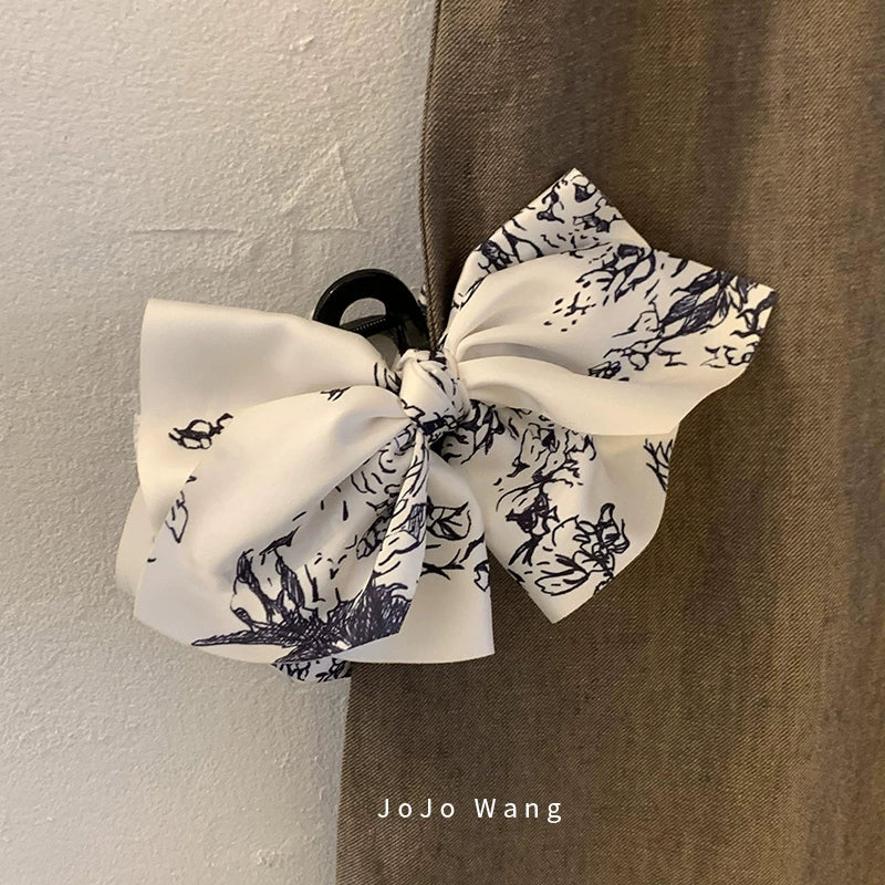 Satin bow hair catcher