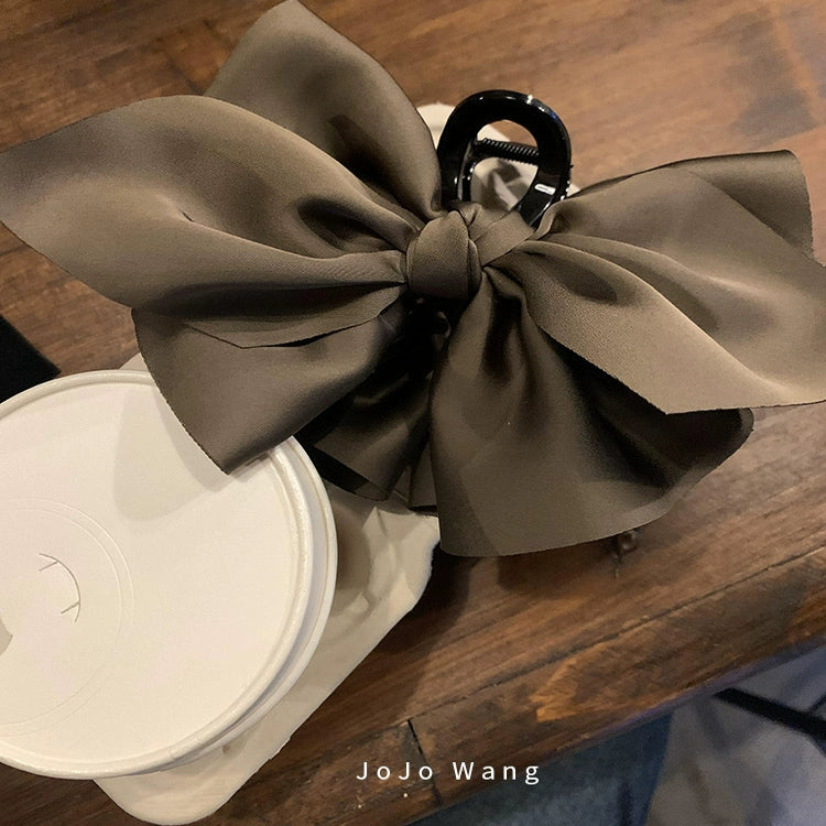 Satin bow hair catcher